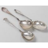 Three Danish silver table or fruit spoons, two with hammered decoration, the other embossed with ros