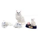 A group of Beswick pottery figures, modelled as white Persian cats, comprising the figure entitled P