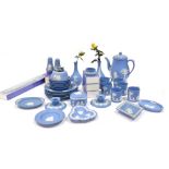 A group of Wedgwood light blue Jasperware, including demitasse coffee cans and saucers, pair of cand