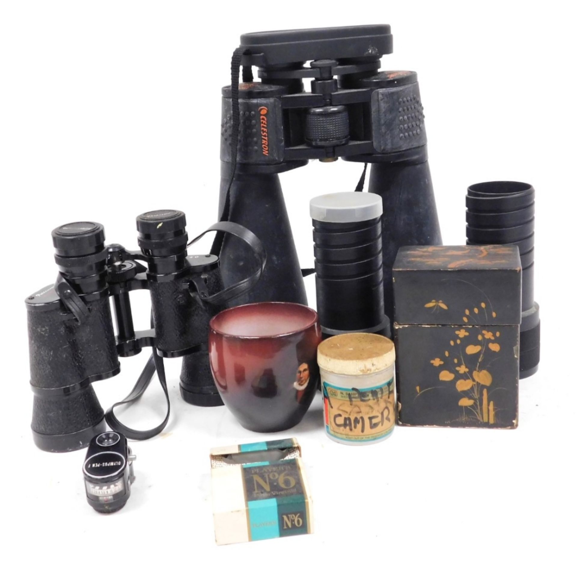 A pair of Skymaster 25x70 FOV-2.7 binoculars, pathescope binoculars, Kodak lens, lacquer box contain