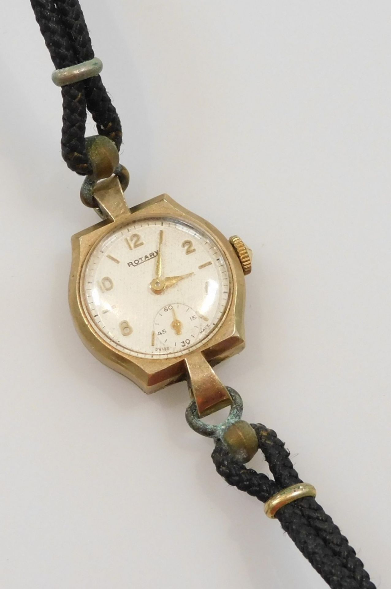 A Rotary lady's 9ct gold cased wristwatch, the circular silvered dial with engine turned decoration,