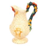 A Clarice Cliff Newport Pottery Harvest ware jug, of baluster form, moulded with fruit and bales of