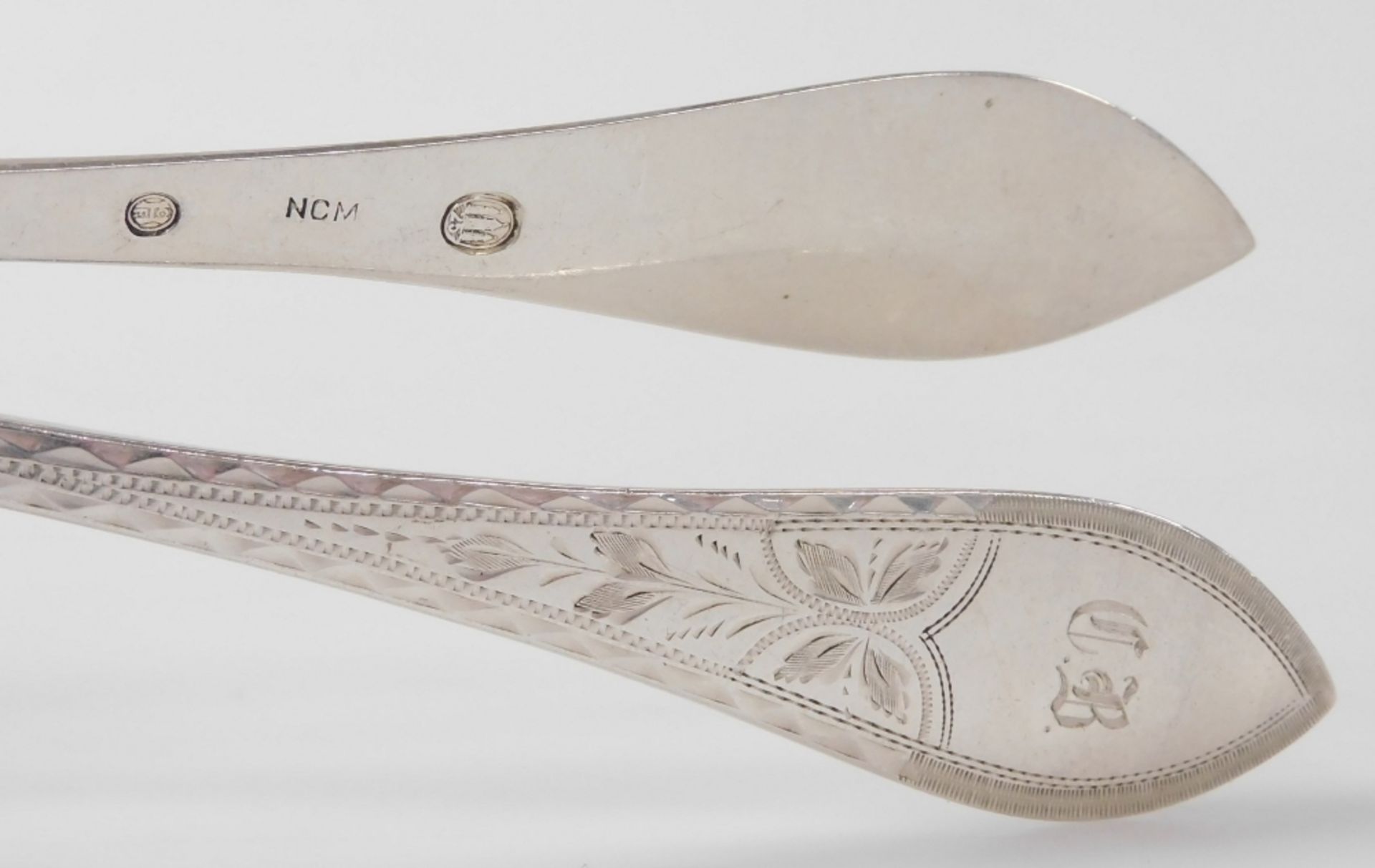 A set of eight Meyer Danish silver dessert spoons, foliate engraved, shield reserve monogram engrave - Image 2 of 2