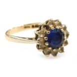 A 9ct gold sapphire and white sapphire set flower head ring, one stone lacking, size O/P, 2.7g.