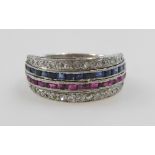 A diamond, ruby, and sapphire half hoop eternity ring, set with a band of baguette cut rubies, and s