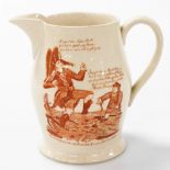 An early 19thC 'Success To The Volunteers" creamware jug, printed in ochre within a frame of vines a
