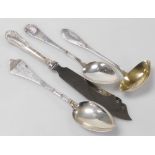 A group of Danish silver, comprising two silver dessert spoons, one with a scalloped shell terminal,
