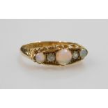 An 18ct gold opal and diamond five stone ring, in a claw setting, size O, 3.4g.