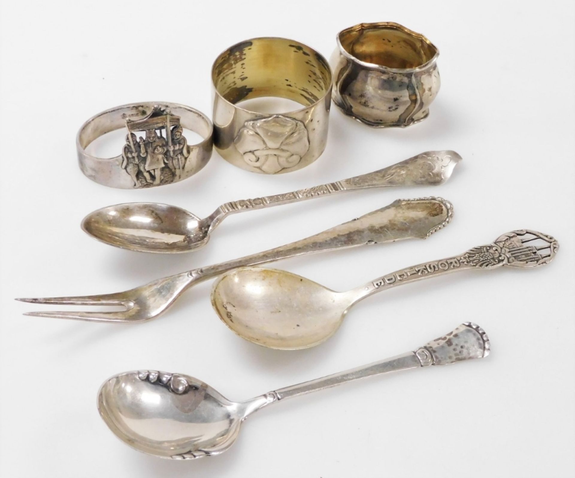 A group of Danish silver, comprising three silver tea and jam spoons, one commemorating the city of