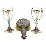 A pair of Edward VII Art Nouveau silver bud vases, of twin handled waisted form, loaded, Williams (B