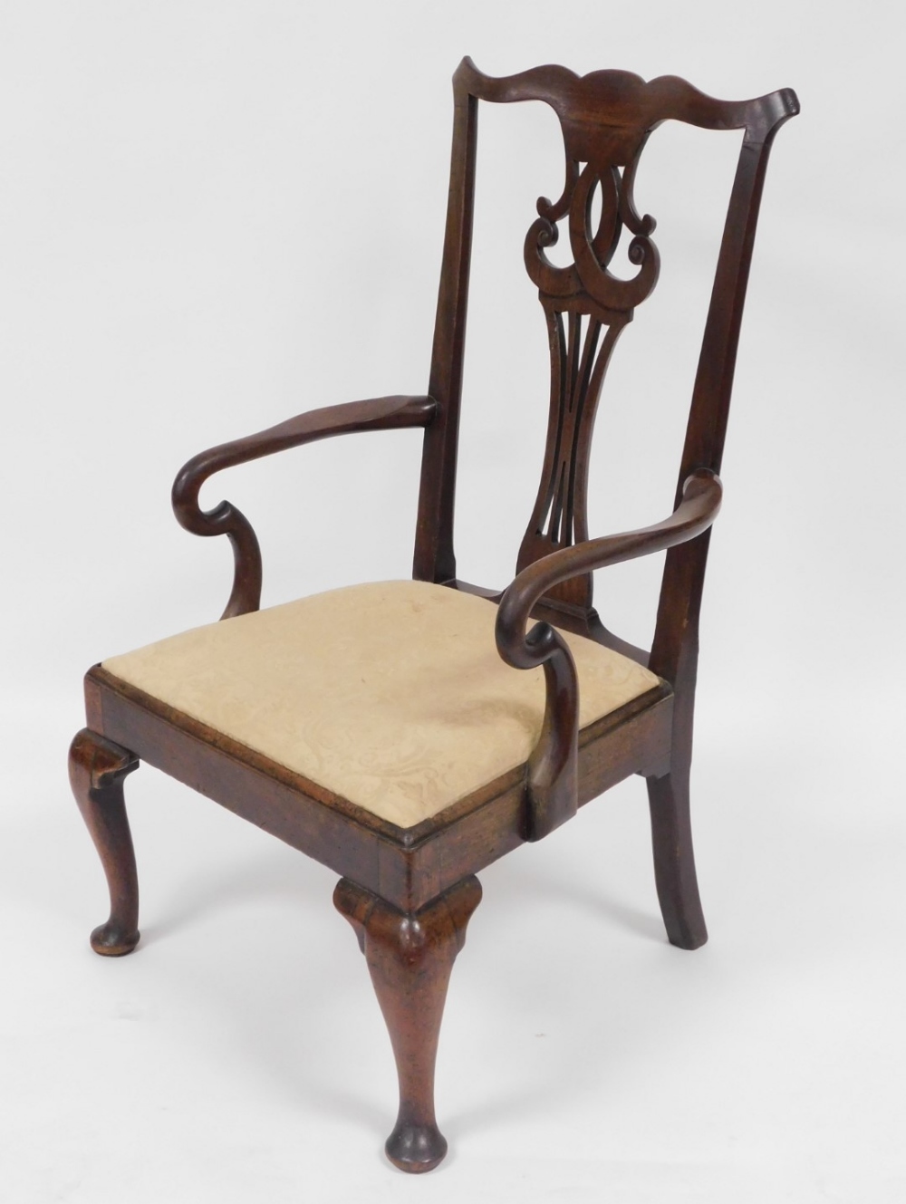 A Georgian Chippendale style mahogany carver chair, with a carved splat, drop in seat, raised on cab