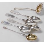 A group of Scandinavian white metal tablewares, to include a sugar sifting spoon, berry spoon, desse