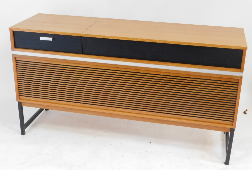 A Decor Solid State 727 teak cased radiogram, with a Garrard turntable, 74.5cm high, 139cm wide, 43c