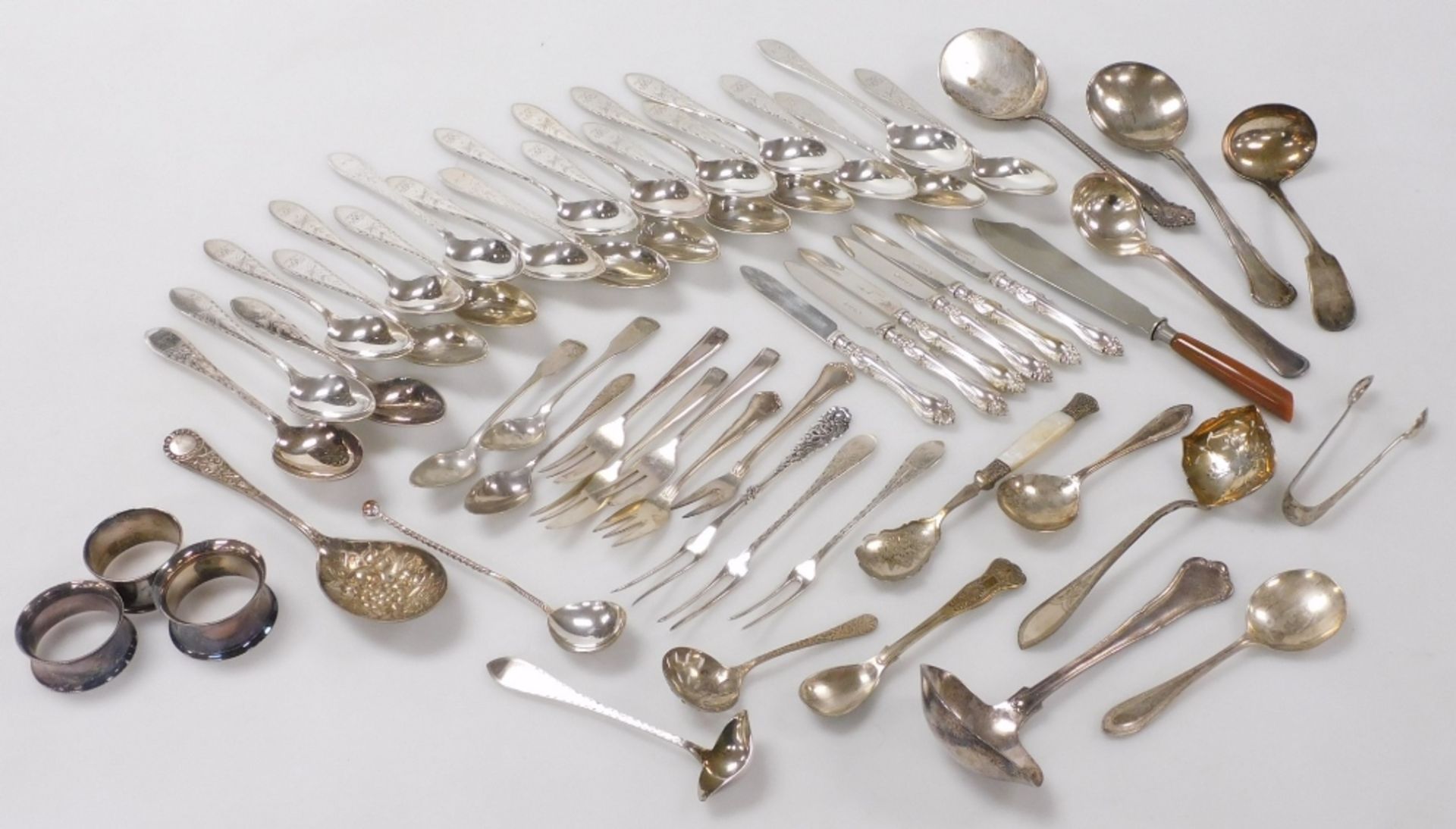A group of Danish and other silver plated flatware, to include dessert spoons, pickle forks, ladles,