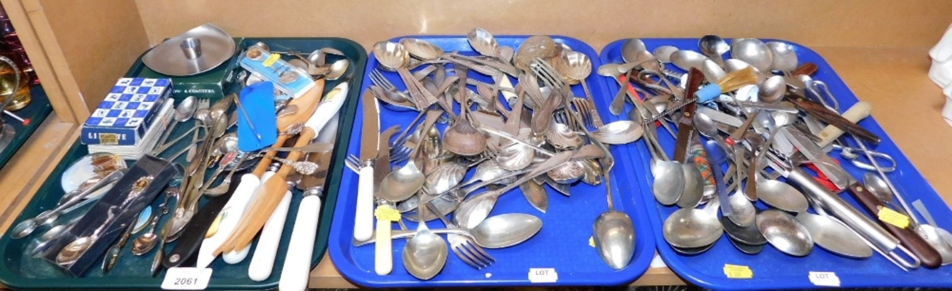 A group of flatware, to include berry spoons, teaspoons, serving spoons, commemorative spoons, sugar