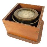 An early 20thC brass cased gimbal compass, boxed, lacking lid.