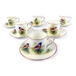 A set of six Royal Worcester porcelain demi tasse coffee cans and saucers, each painted with birds b