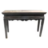 A 19thC Oriental elm altar table, 100cm high, 145cm wide, 45cm deep.