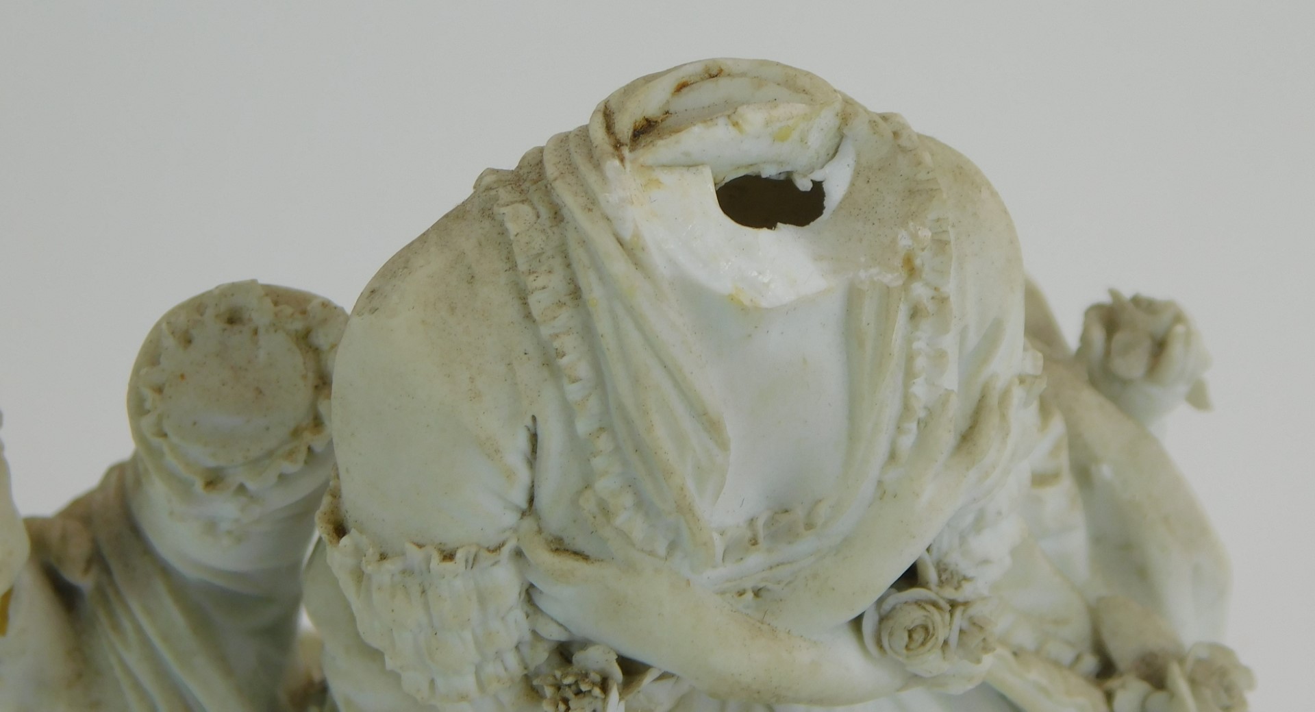A 19thC Parian figure group, modelled in the form of two ladies, one seated beside a basket of fruit - Image 2 of 2