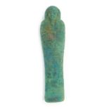 An Egyptian Ushabti funerary figure, 16cm high.