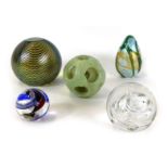 A ribbed opalescent glass paperweight, 7cm high, a coloured twist marble, a clear glass marble, a do