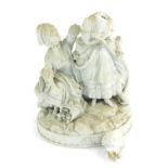 A 19thC Parian figure group, modelled in the form of two ladies, one seated beside a basket of fruit