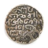 A silver Arakanese Tanka, possibly Bengali, with script to the obverse and reverse, bears stamp mark