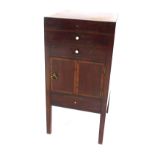 A George III mahogany night table, with lift top, drawers, and cupboards, 71cm high..