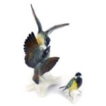 Two Karl Ens porcelain bird figures of birds, comprising a large twin birds in flight on branch, 31c