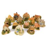 A collection of Lilliput Lane cottages, comprising Purbeck Stores, Nest Egg, Kentish Brew, Make A Wi