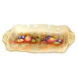 An Aynsley Orchard Gold pattern rectangular sandwich plate, painted with fruit by N Brunt, with a fl