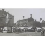 A monochrome photograph titled Bourne Market Place 1955, 25cm x 39cm.