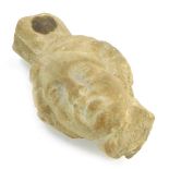 A Roman carved marble head of a female, 13cm high.