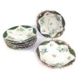 A 19thC Copeland and Garratt porcelain part dessert service, decorated on a white ground with green