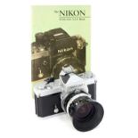 A Nikon Nikkormat SLR No 3152685 camera, with Nikkor 28mm lens, No 886608, and a Nikon F2SB-S2S-F2-F