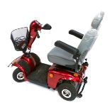 A Free Rider Mayfair red mobility scooter, with battery.