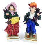 A pair of 20thC Sitzendorf porcelain figures, modelled as urchin faggot collectors, raised on square