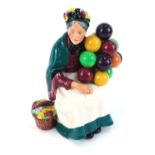 A Royal Doulton The Old Balloon Seller figure, HN1315, 20cm high.