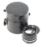 A Nikon F 85mm F2 lens with case.