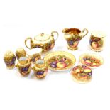 A group of Aynsley Orchard Gold pattern wares, all painted with fruit, comprising a twin handled suc