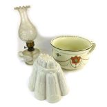 A Royal Doulton Albany chamber pot, late 19thC turreted top jelly mould, and a clear glass oil lamp,