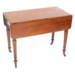 A Victorian mahogany Pembroke table, the rectangular top with moulded edge and rounded corners, on t