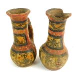 A pair of late 19thC pottery vases, with red and black pigmented decoration.