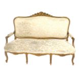 A 19thC giltwood sofa, with rococo gilt show frame, damask upholstery, shell carved frieze, and cabr