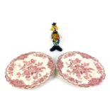 Two Crown Ducal Bristol pattern pottery red and white plates, 25cm wide, and a Murano glass figure o