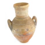 A large earthenware Greco-Roman two handled vase, 30cm high.