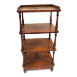 A Victorian figured walnut whatnot, with four heights and single drawer, on turned supports, 124cm h