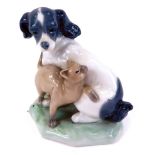 A Nao by Lladro porcelain figure group, of a dog and cat, 11cm high.
