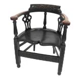A Victorian bow chair, with carved oak framing, saddle seat and square framing. Ex Cheffins lot 579