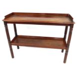 A Victorian mahogany buffet, with tray top and reeded supports and legs, 83cm high, 112cm wide.